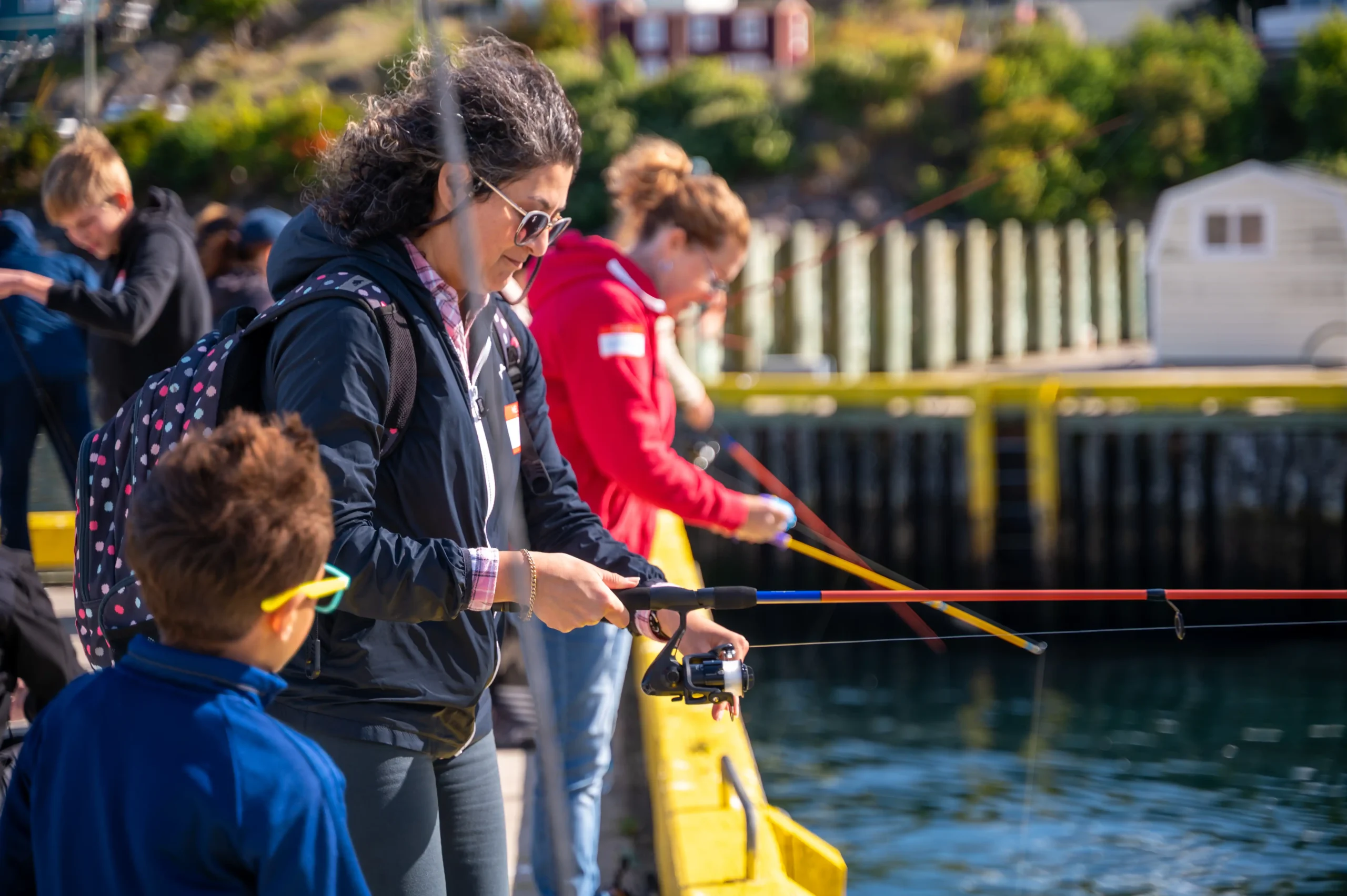 Participants fishing in bloom event