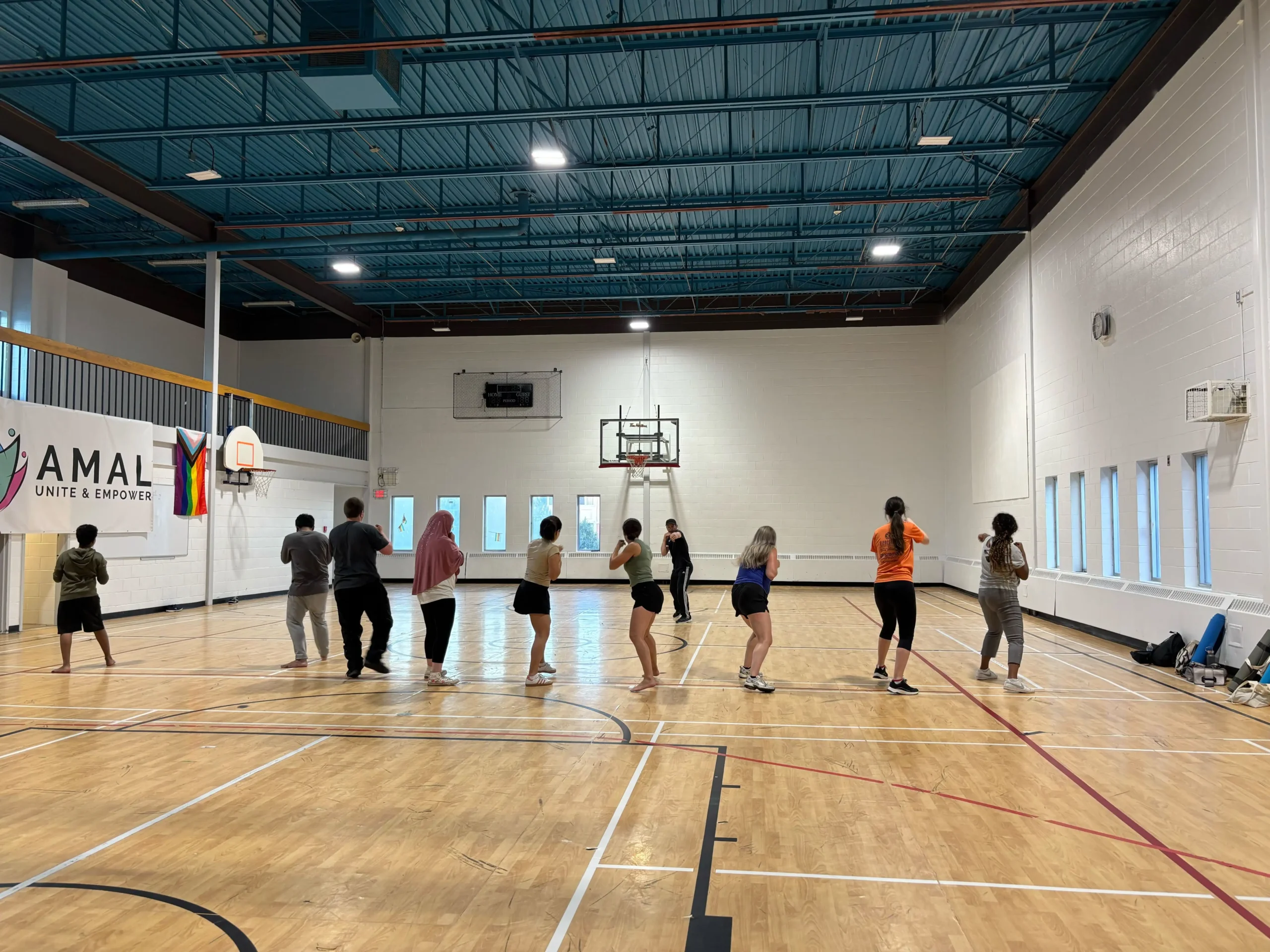 Participants practicing self defense in Bloom event
